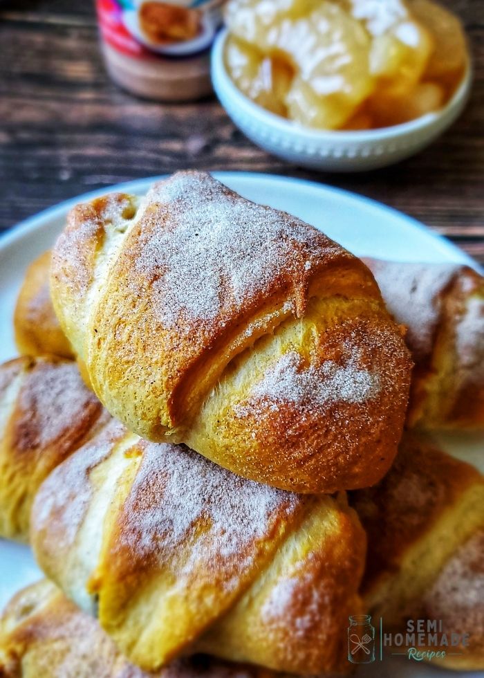 Crescent rolls, apple pie filling and cinnamon sugar comes together to make the sweetest little Crescent Roll Apple Dumplings for dessert!