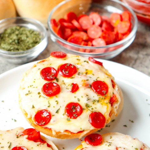 Mini Pizza Bagels on a white plate