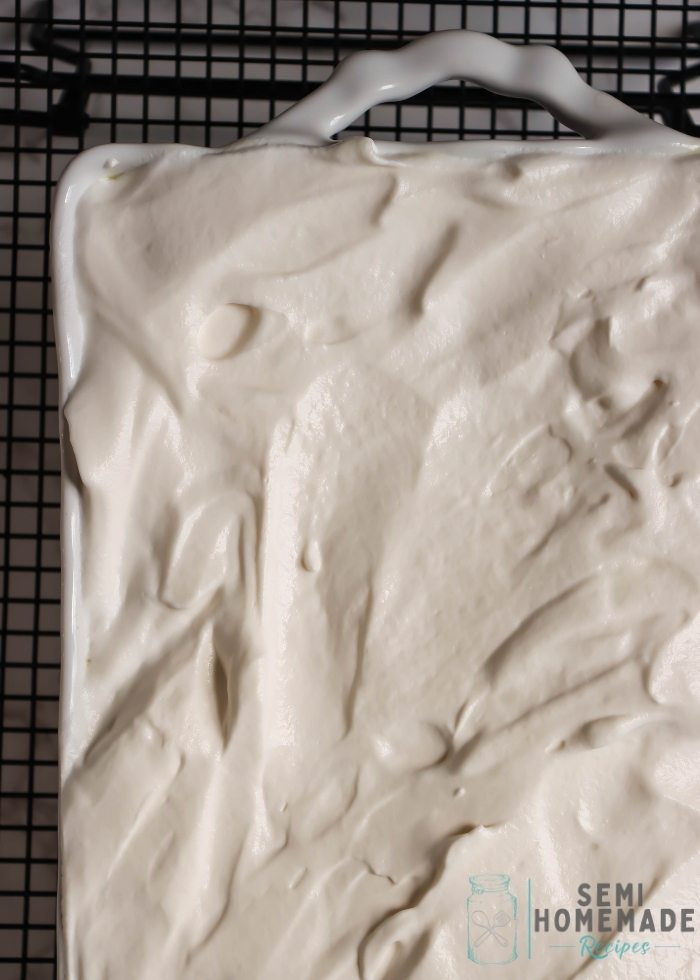 Overhead shot of whipped topping on cake