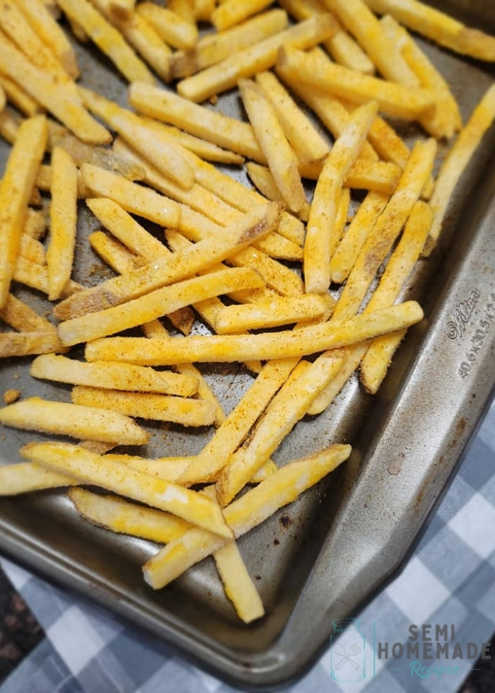 frozen fries on baking pan