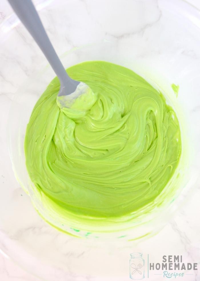 Coloring White chocolate green in large bowl