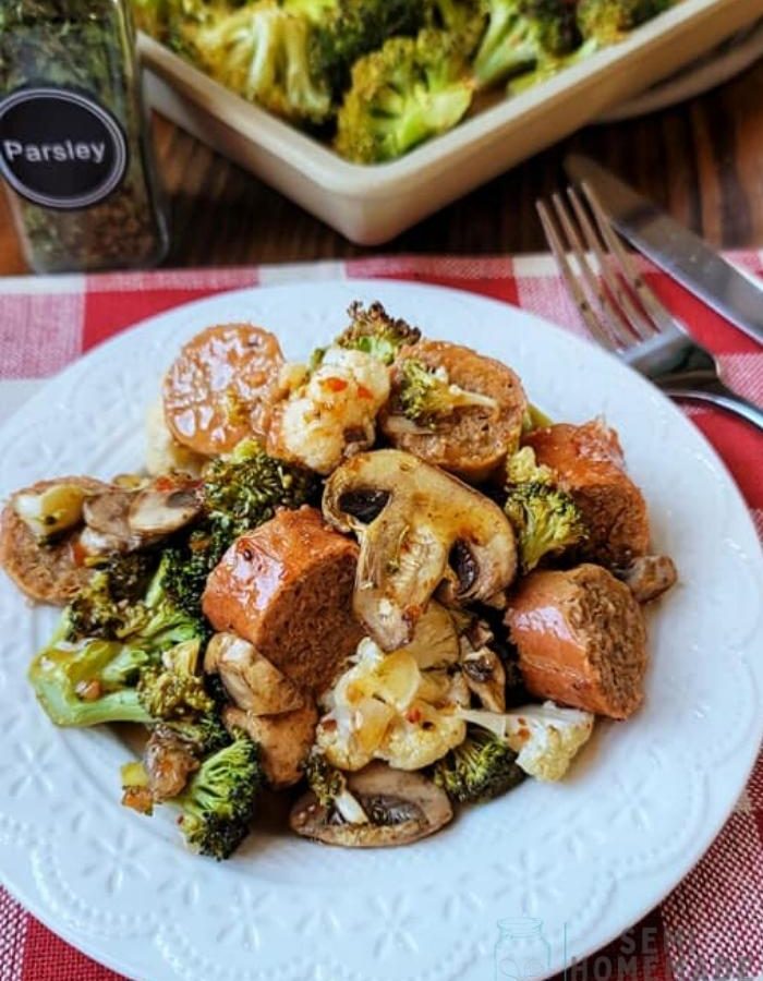 30 Minute Sausage Broccoli Mushroom Sheet Pan Meal on white plate (2)