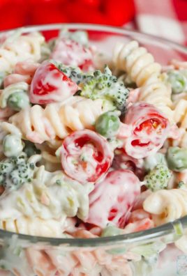 Cold Ranch Pasta Salad - Tri Colored Rotini is mixed together with halved cherry tomatoes, fresh broccoli florets, green peas, matchbox carrots and cold ranch dressing for a super easy summer pasta salad!
