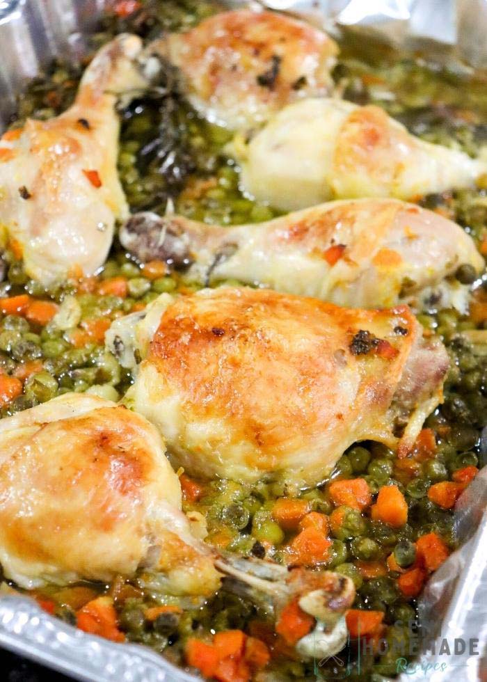 baked Chicken Peas and Carrots and fresh Rosemary in a pan