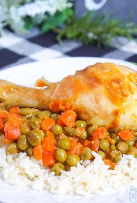 baked Chicken Peas and Carrots and fresh Rosemary on a bed of wh