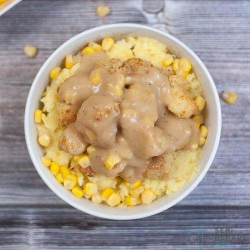chicken and mashed potatoes and corn and gravy