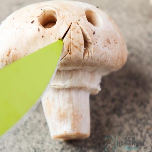 Cutting nose into mushroom