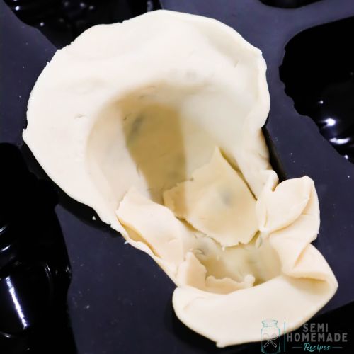 Pie dough inside of Skull Cherry Pies Mold
