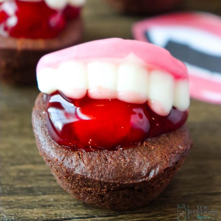 Semihomemade Halloween Vampire Brownie Bites would look perfect on a cake tray for your next Halloween party! You're going to love how easy this Halloween dessert is to make!