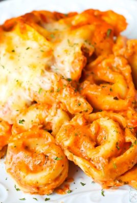 Baked Cheesy Tortellini Casserole - Ground Turkey (or ground beef), is seasoned and browned before being mixed together with spaghetti sauce, cream cheese and cheesy tortellini before being covered in cheese and baked in the oven.