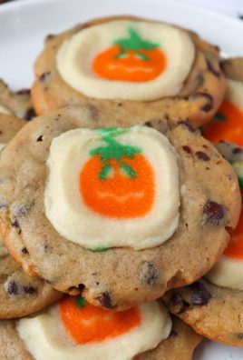 Easiest Halloween Cookies Ever - premade chocolate chip cookie dough and premade pumpkin sugar cookie dough come together to make some of the Easiest Halloween Cookies that you'll ever make.