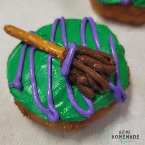 chocolate frosting for broom bristles with purple string