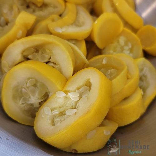 cooked yellow squash in mixing bowl