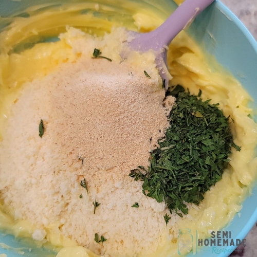 softened butter with parm cheese, garlic power and parsley