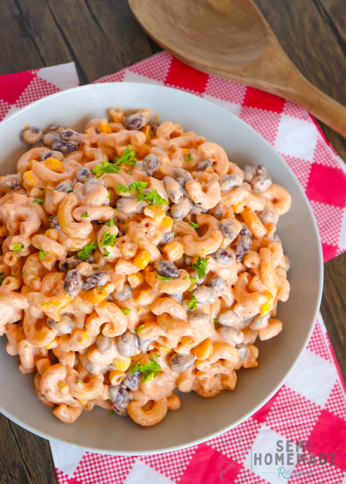 Serve and impress with this BBQ Taco Macaroni Pasta Salad that will be the star of any gathering. Its vibrant colors and enticing aroma will instantly draw everyone's attention, while the extraordinary blend of flavors will keep them hooked. Whether you're hosting a casual backyard barbecue or a sophisticated dinner party, this dish is sure to leave a lasting impression. 