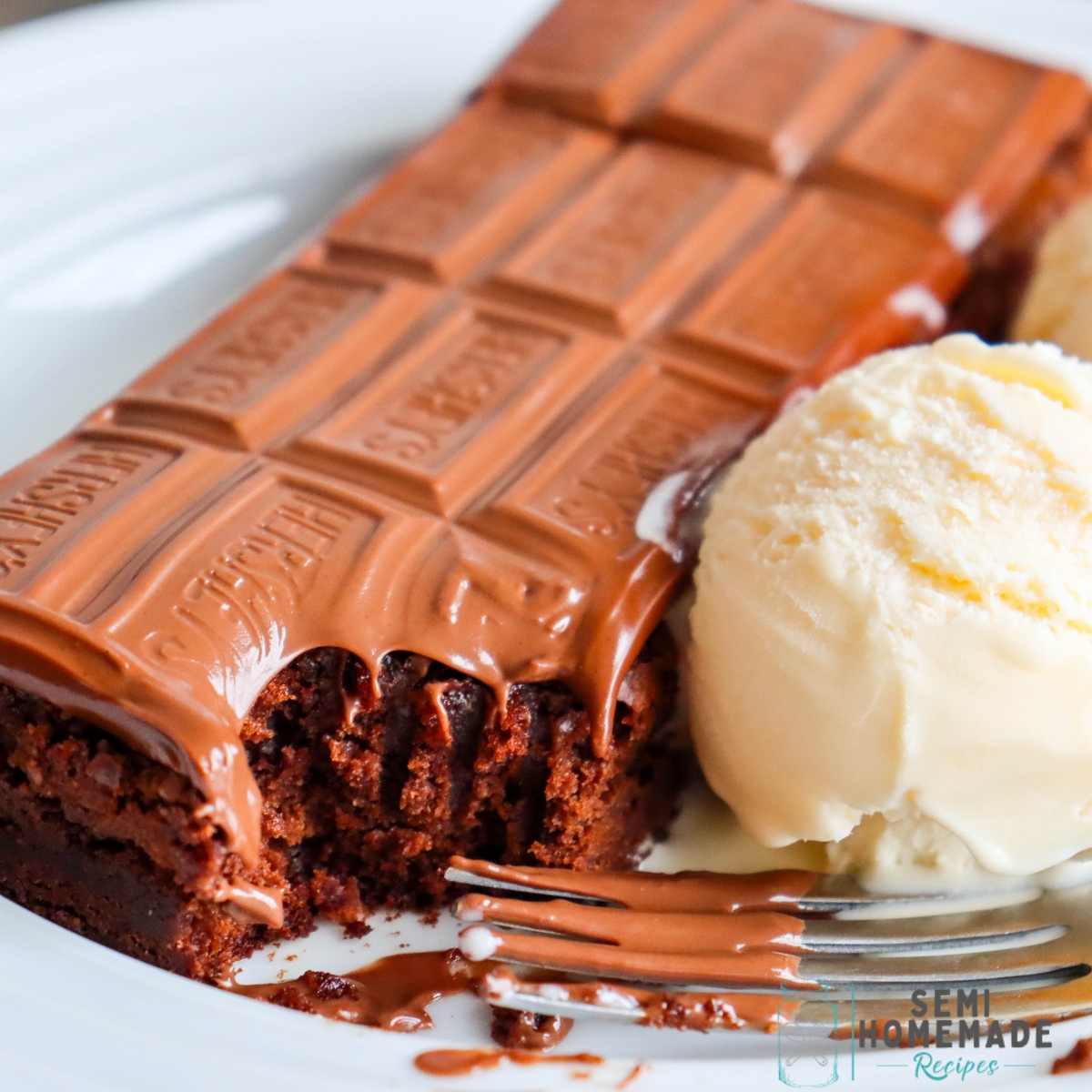 The Hershey© Brownie from Texas Steakhouse is a dessert that reminds me of going out to eat when I was a kid! It's a warm brownie with an entire Hershey© chocolate bar melted on top and served with vanilla ice cream!