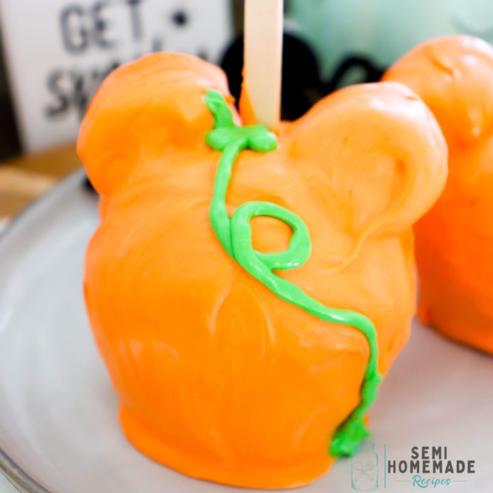 Copycat Disney Mickey Pumpkin Caramel Apples are super cute and perfect for anyone that loves Disney and Halloween!