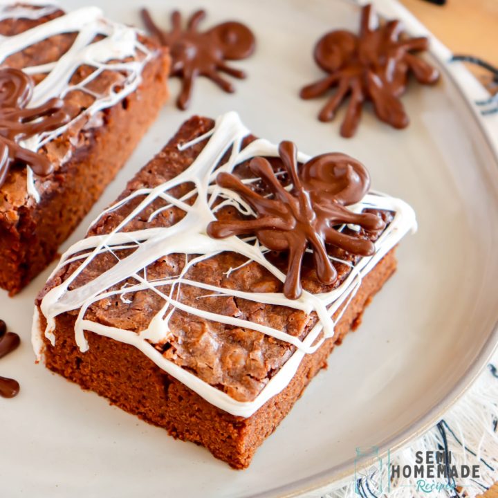 Let these Spider Web Brownies crawl right into your Halloween dreams...errr nightmares! These semihomemade brownies are decorated with marshmallow webs and chocolate spiders for the perfect Halloween treat!