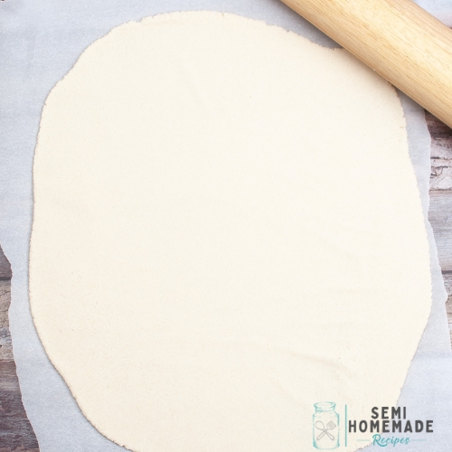 rolling out Homemade Salt Dough Ornament dough