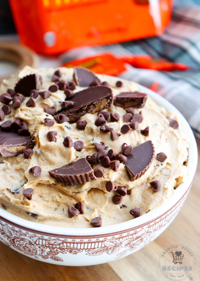 peanut butter dessert dip with chocolate chips and Reese&rsquo;s peanut butter cups