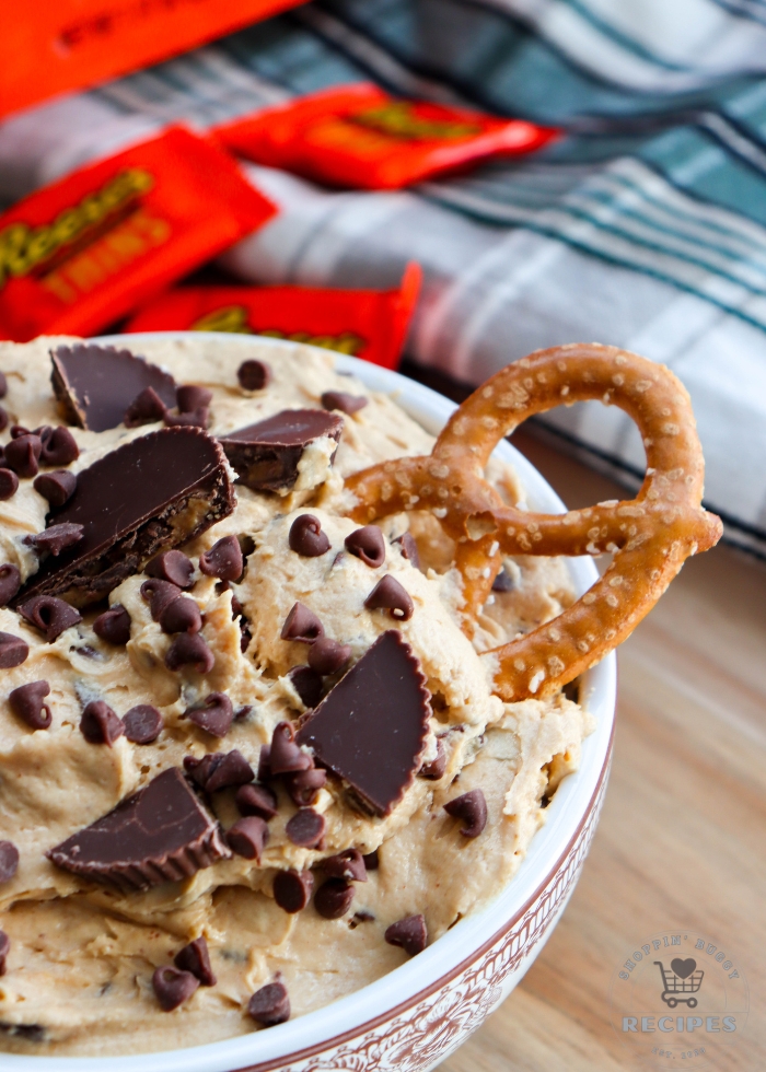 Reese&rsquo;s peanut butter cup dessert dip served with pretzels for dipping