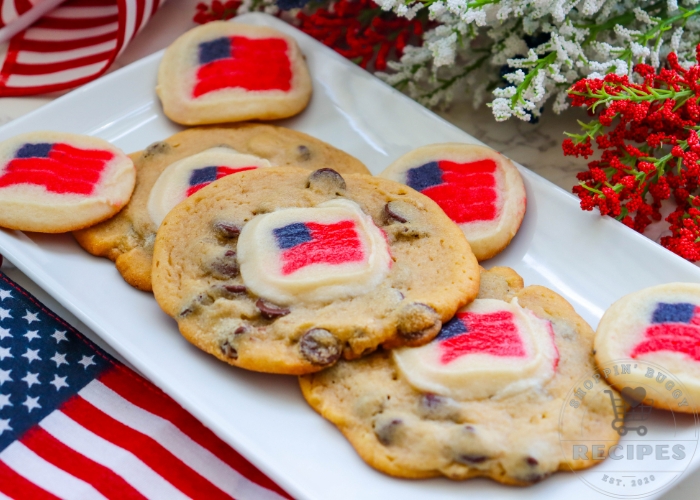 Patriotic cookies made with chocolate chip cookie dough and flag sugar cookies