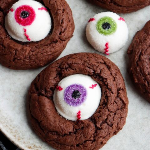 These Chocolate Eyeball Cookies start with a box of chocolate cake mix and get a spooky little finishing touch from marshmallow eyeballs! They’re an easy Halloween treat to make when you want something fun without spending all afternoon decorating cookies.